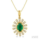 1/8 ctw Floral Pattern 6x4mm Oval Cut Emerald & Round Cut Diamond Precious Pendant With Chain in 10K Yellow Gold