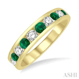 1/2 ctw Round Cut Diamond and 2.9MM Emerald Precious Wedding Band in 14K Yellow Gold